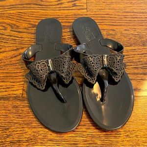 Women’s black Ferragamo hard plastic flip flops size 8